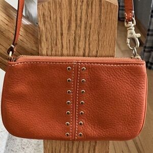 Michael Kors orange, gold tone Studded wristlet, clutch, zipper pouch